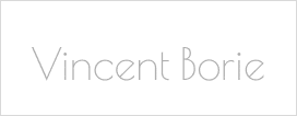 Nom "Vincent Borie" écrit en caractères gris clair et fins sur un fond noir uni, dans une police moderne et élégante.